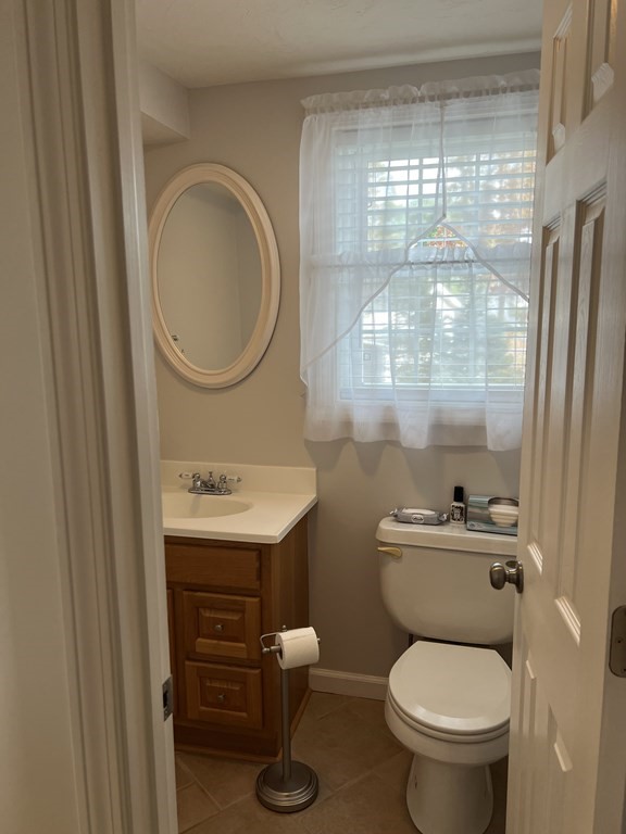 34 Colonial Road Webster, MA 01570 - Photo 20 of 35 a bathroom with a toilet a sink and a shower