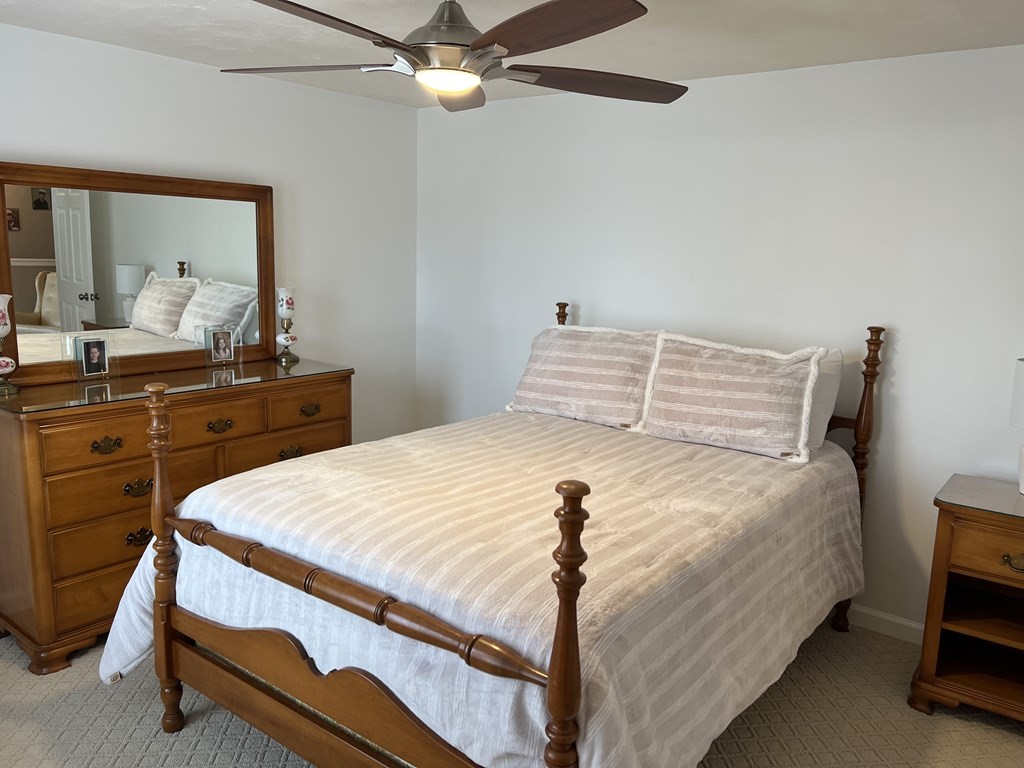 34 Colonial Road Webster, MA 01570 - Photo 21 of 35 a bedroom with a bed and a dresser