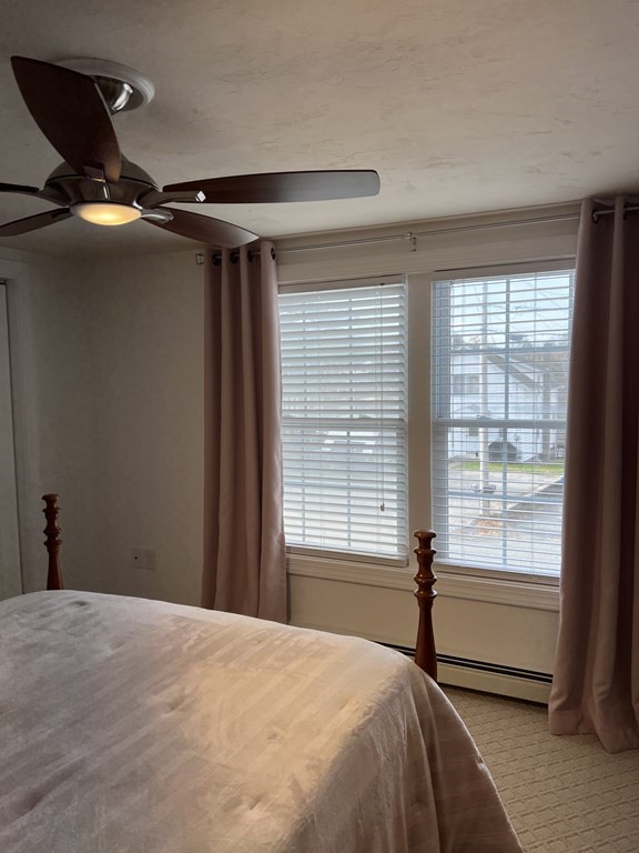 34 Colonial Road Webster, MA 01570 - Photo 22 of 35 a bedroom with a bed and a window