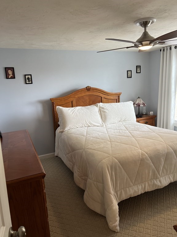 34 Colonial Road Webster, MA 01570 - Photo 27 of 35 a bedroom with a bed and dresser