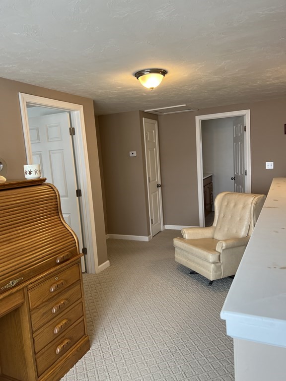 34 Colonial Road Webster, MA 01570 - Photo 31 of 35 a bedroom with furniture and a mirror