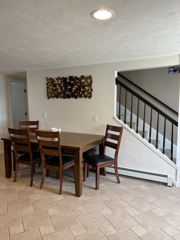 34 Colonial Road Webster, MA 01570 - Photo 6 of 35 a view of a workspace with furniture
