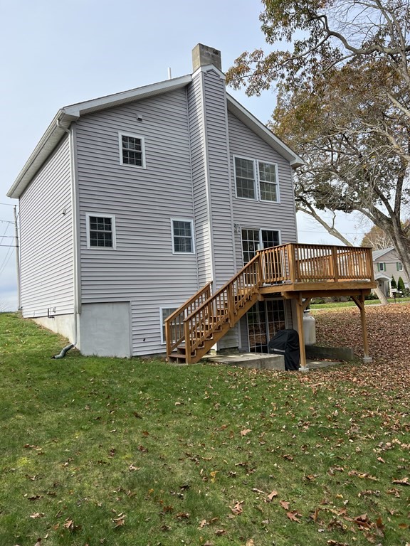34 Colonial Road Webster, MA 01570 - Photo 9 of 35 a view of a house with a yard