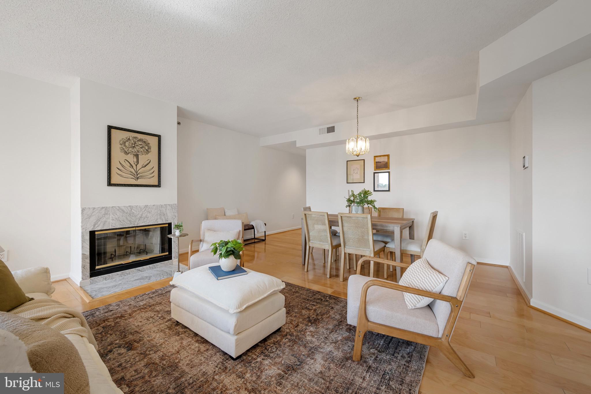 930 Astern Way, Unit 609 Annapolis, MD 21401 - Photo 10 of 47 Living & Dining Rooms with Fireplace