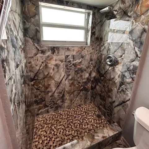 a bathroom with a toilet