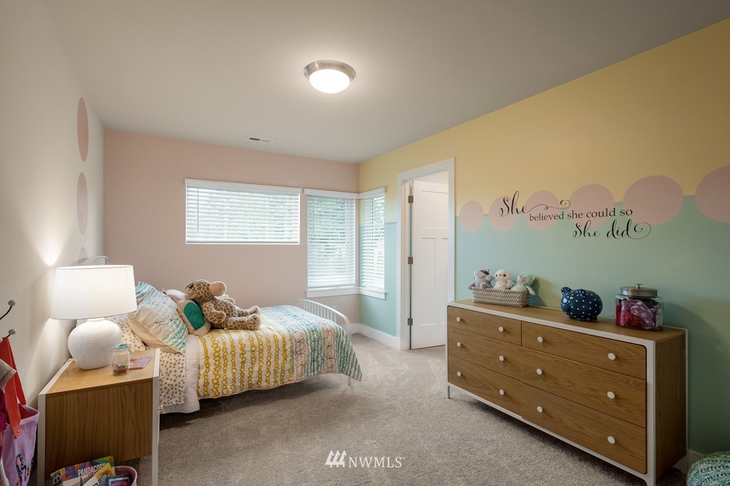 3602 200th Place Southeast, Unit KF15 Bothell, WA 98012 - Photo 18 of 34 a bedroom with furniture and a window