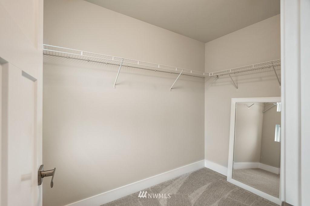 3602 200th Place Southeast, Unit KF15 Bothell, WA 98012 - Photo 19 of 34 a view of an empty walk in closet