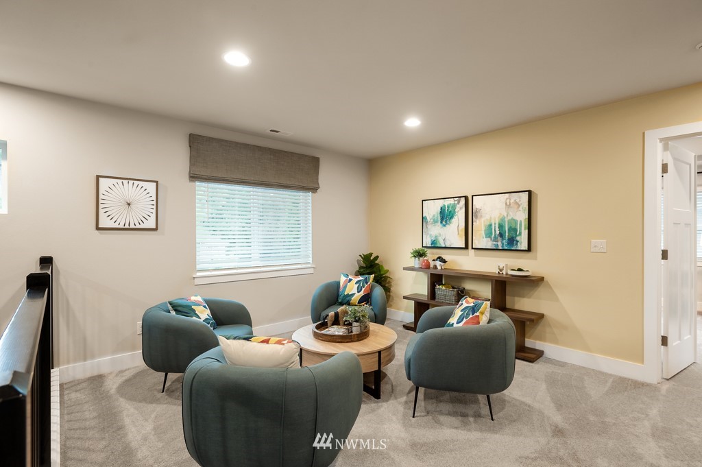 3602 200th Place Southeast, Unit KF15 Bothell, WA 98012 - Photo 24 of 34 a living room with furniture and a window