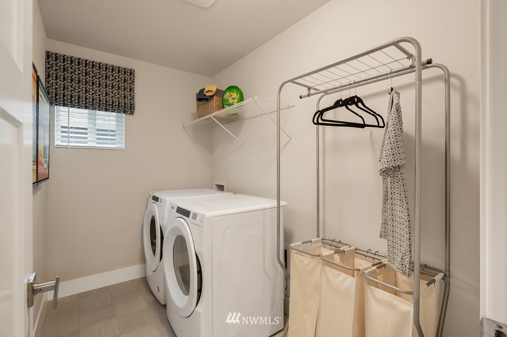 3602 200th Place Southeast, Unit KF15 Bothell, WA 98012 - Photo 28 of 34 a utility room with dryer and washer