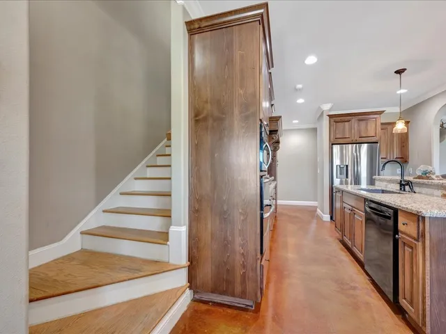 a view of a bathroom with sink and mirror