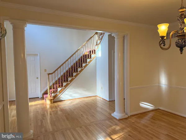 a view of a living room with a fireplace