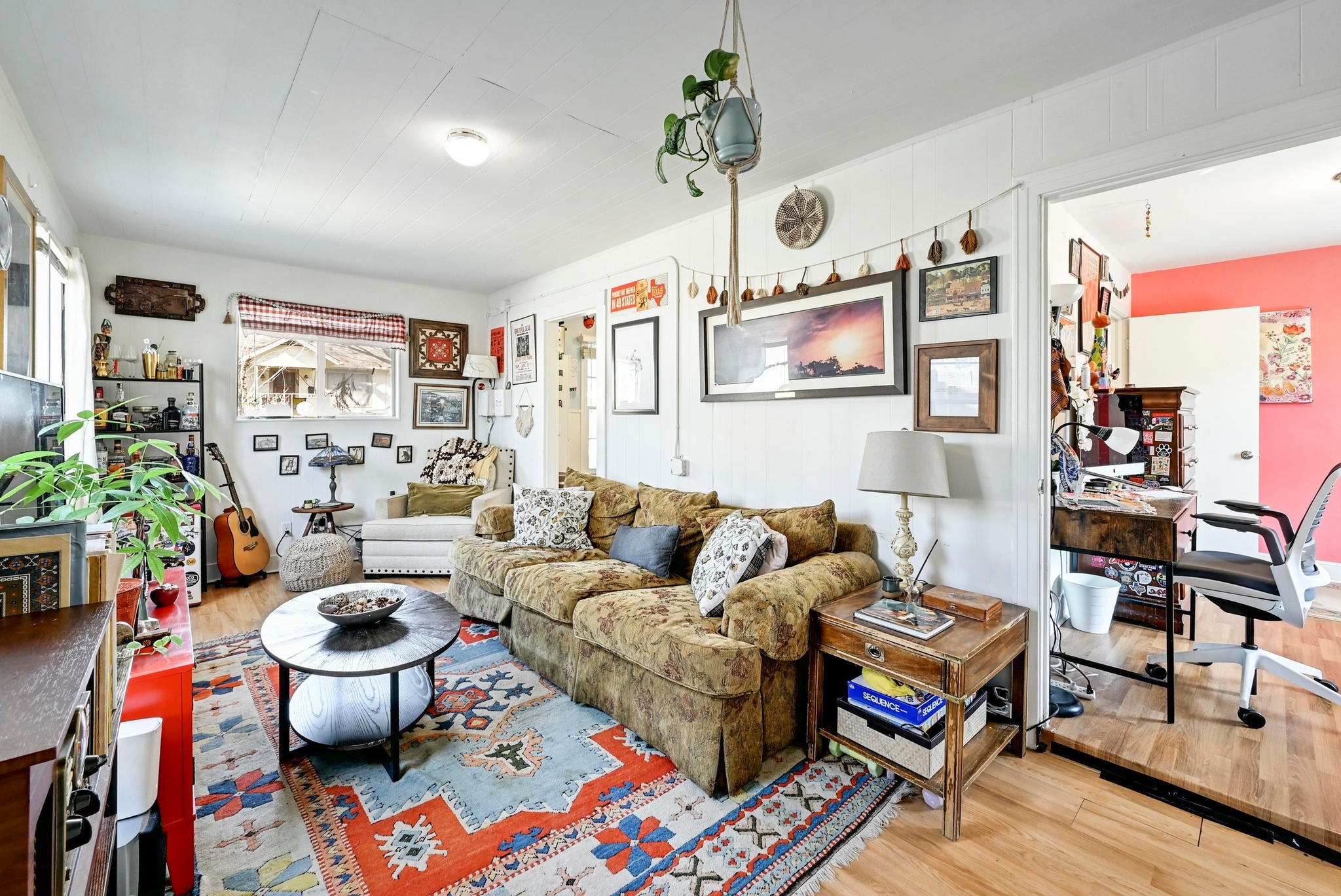 4530 Avenue D, Unit B Austin, TX 78751 - Photo 15 of 29 a living room with furniture and a rug