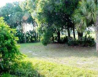 190 Marker Road Rotonda West, FL 33947 - Photo 1 of 1 a view of outdoor space with a swimming pool