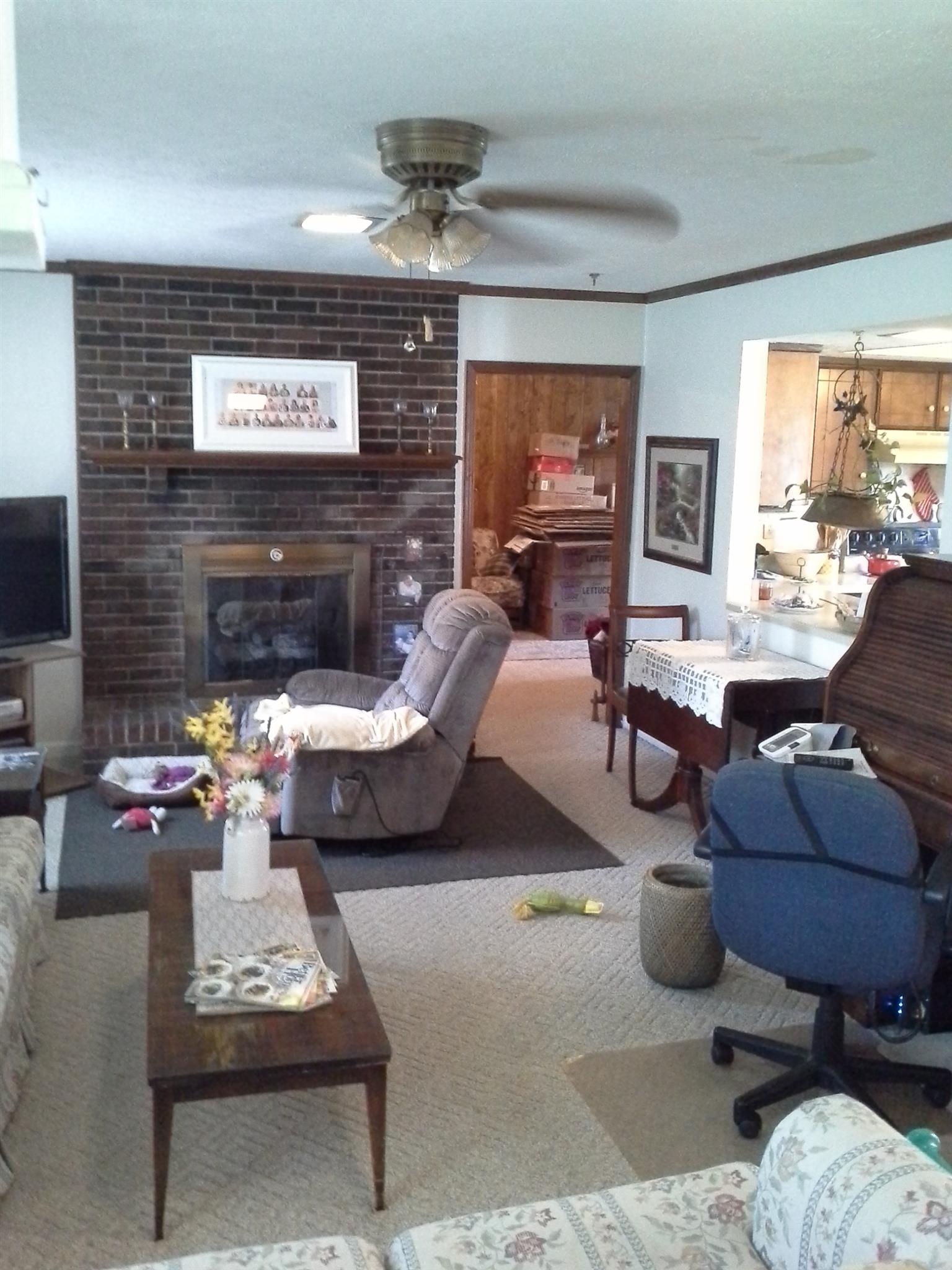 7271 Hoods Branch Road Springfield, TN 37172 - Photo 11 of 11 a living room with furniture and a flat screen tv