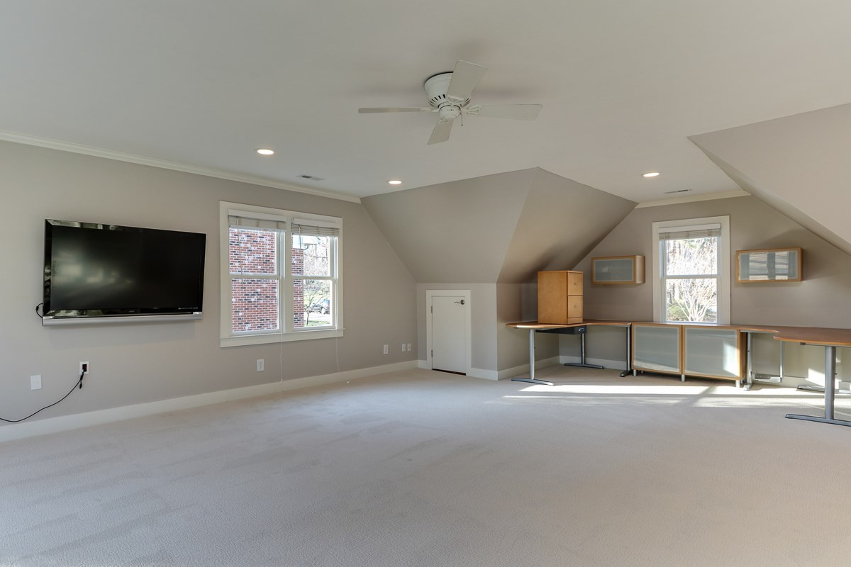 7009 North Ridge Drive Raleigh, NC 27615 - Photo 17 of 25 Bonus room is spacious enough for office and entertainment. Easily accommodates pool table. Bonus Room