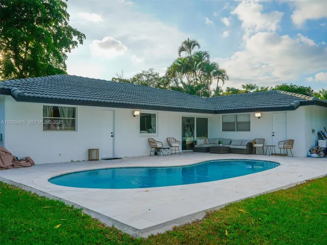 a bathroom with a sink toilet vanity and shower