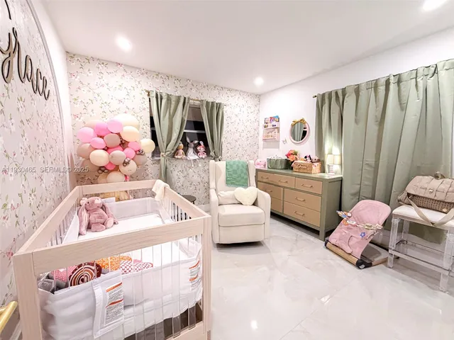 a workspace with furniture and a flat screen tv