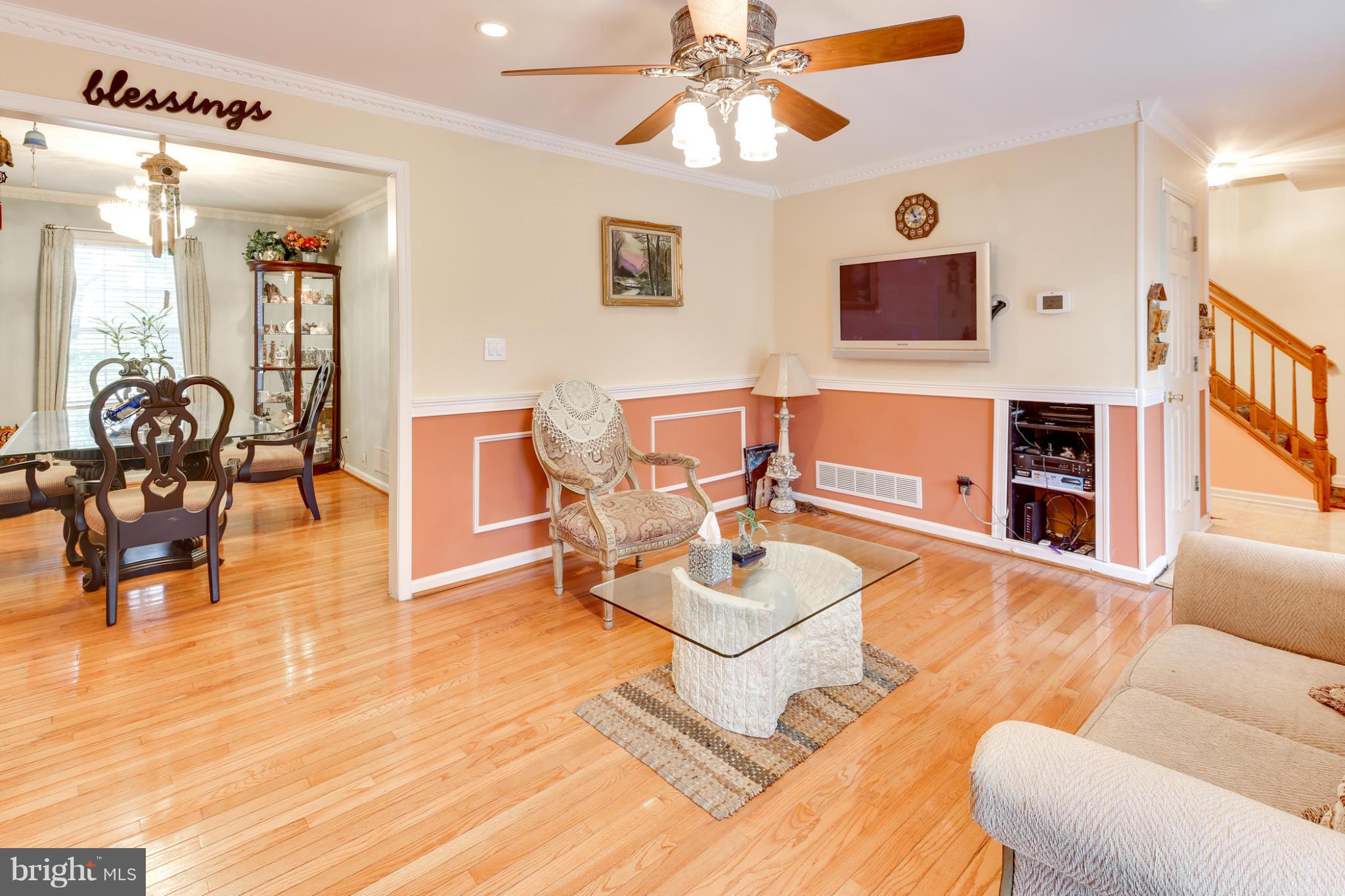 6375 Waterloo Road Elkridge, MD 21075 - Photo 12 of 30 a living room with furniture and wooden floor