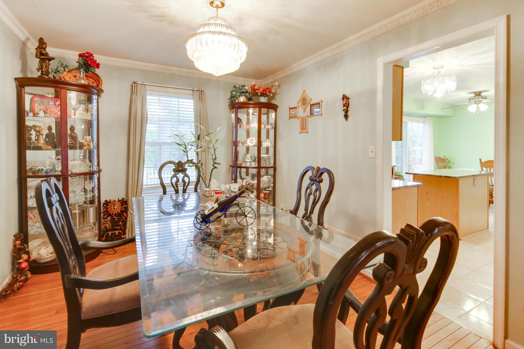 6375 Waterloo Road Elkridge, MD 21075 - Photo 14 of 30 a view of a dining room with furniture