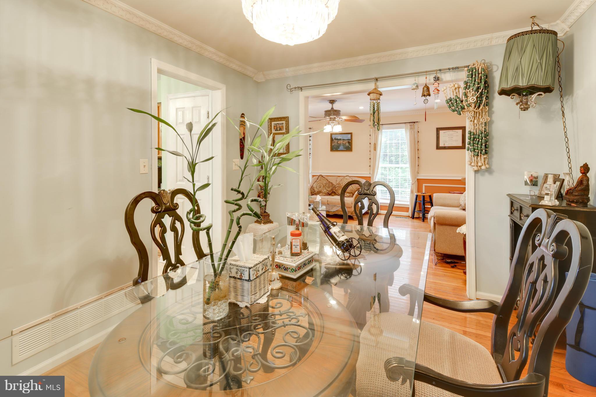 6375 Waterloo Road Elkridge, MD 21075 - Photo 15 of 30 a view of walk in closet with clothes and shoes