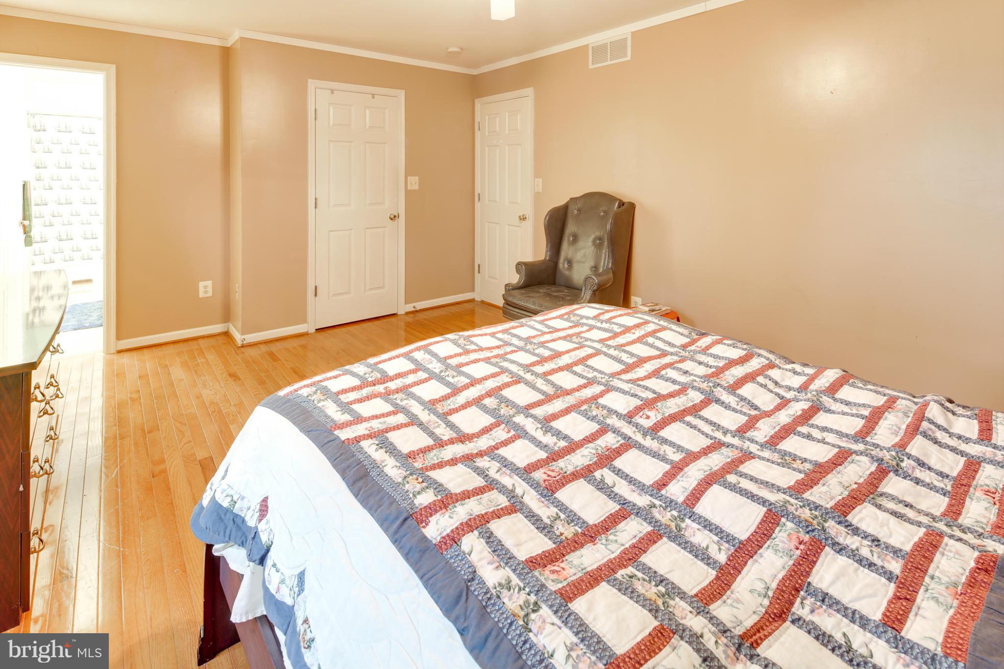 6375 Waterloo Road Elkridge, MD 21075 - Photo 18 of 30 a bedroom with a bed and a window