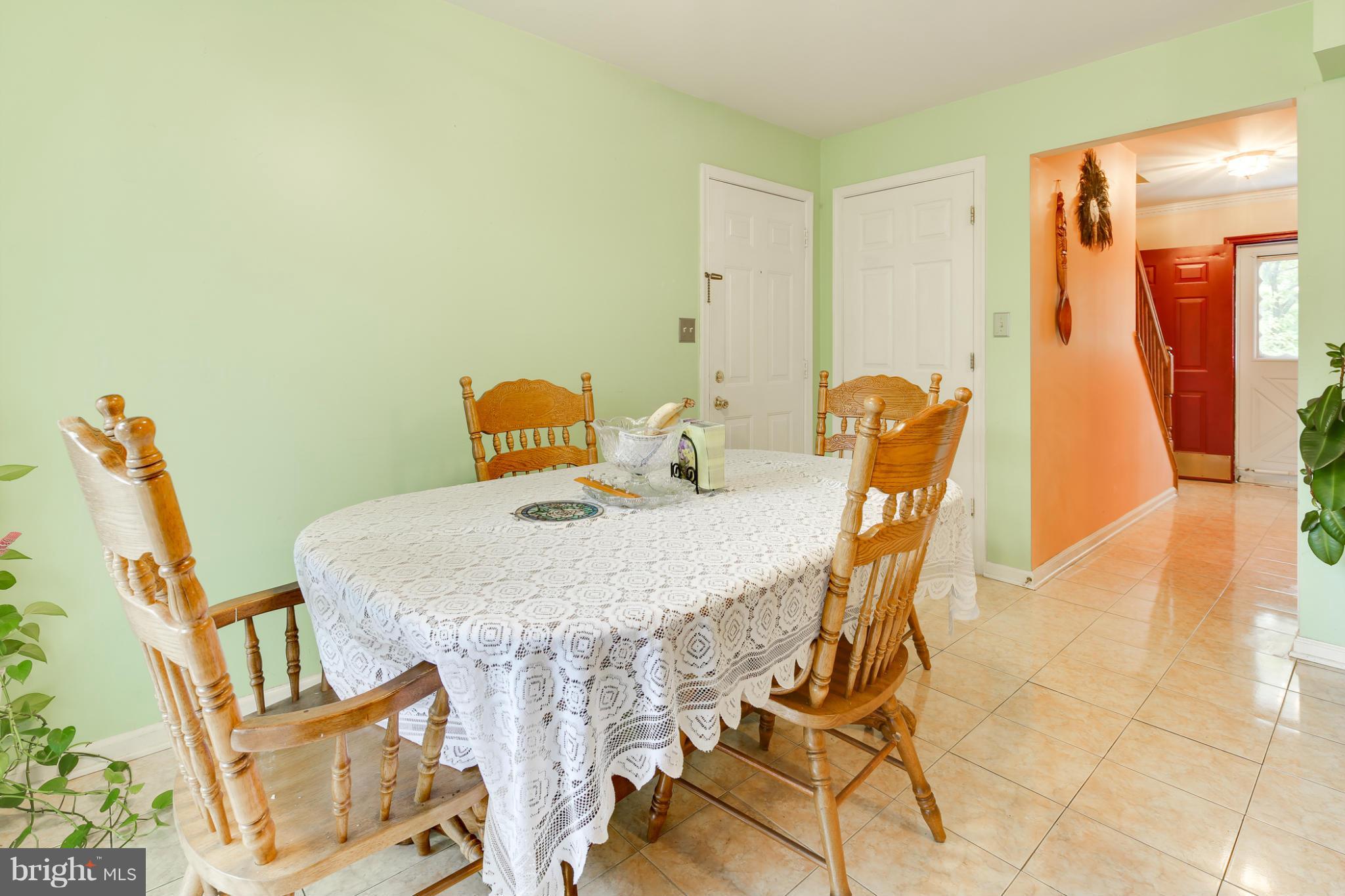6375 Waterloo Road Elkridge, MD 21075 - Photo 8 of 30 a dining room with furniture and wooden floor