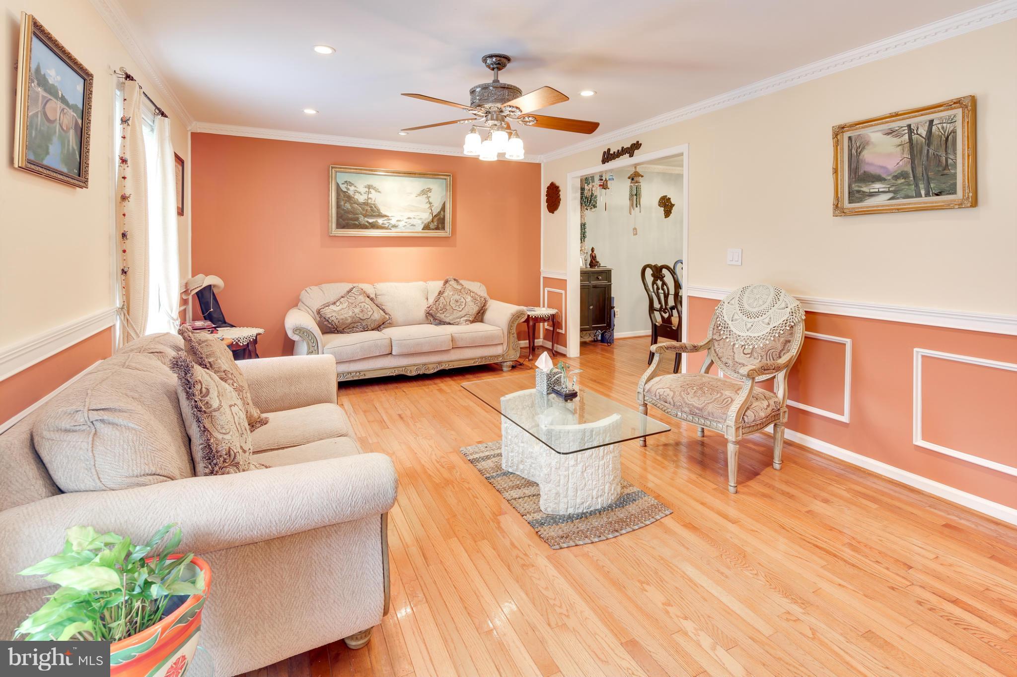 6375 Waterloo Road Elkridge, MD 21075 - Photo 9 of 30 a living room with furniture and a wooden floor