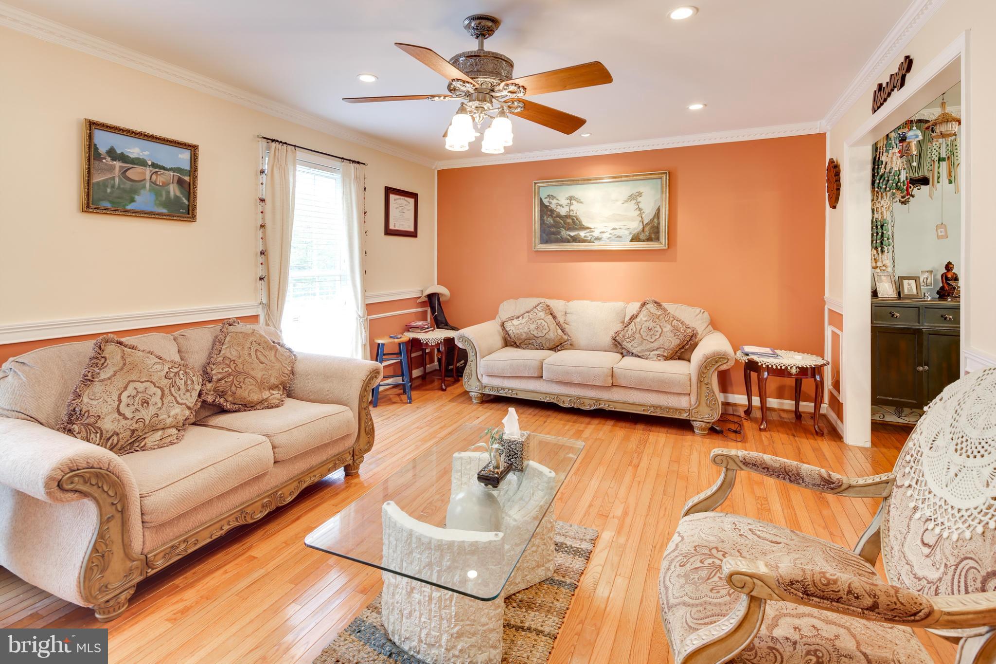 6375 Waterloo Road Elkridge, MD 21075 - Photo 10 of 30 a living room with furniture and a large window