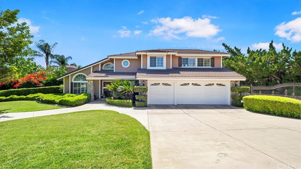 13061 Cherokee Road Rancho Cucamonga, CA 91739 - Photo 1 of 1 a front view of house with yard and green space