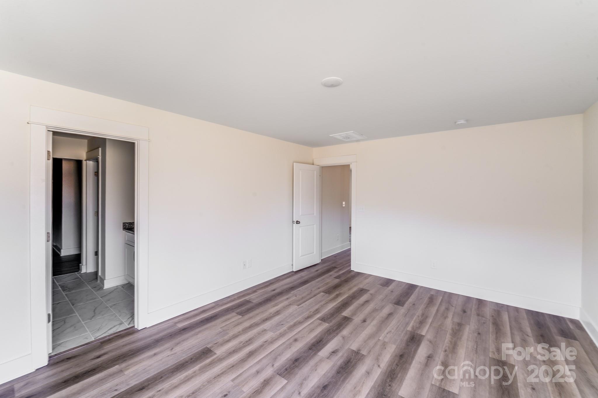 232 Sugar Hill Road Troutman, NC 28166 - Photo 24 of 37 a view of a room with wooden floor