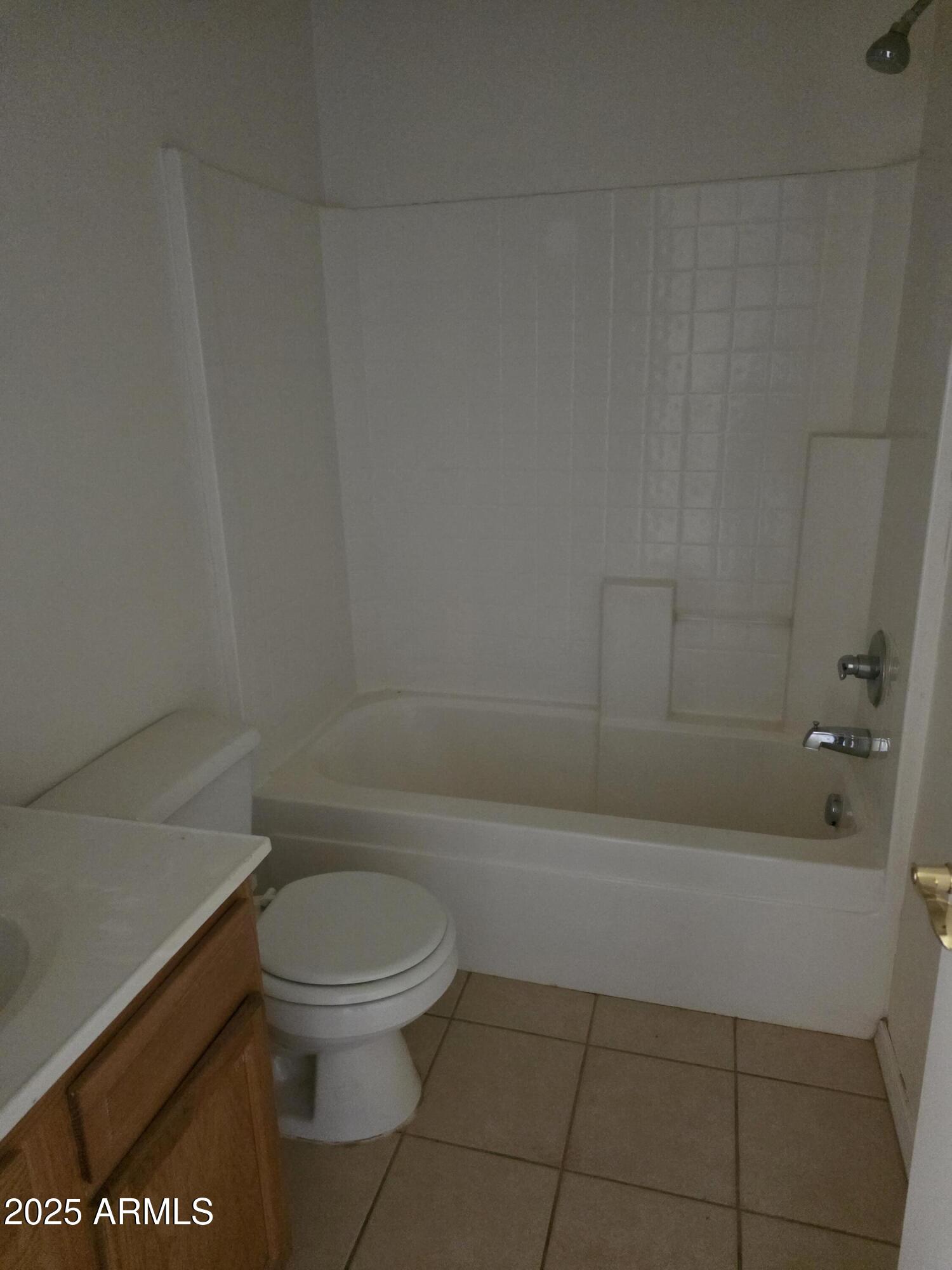 14091 South Berwick Road, Unit 4 Arizona City, AZ 85123 - Photo 9 of 10 a bathroom with a toilet and a shower