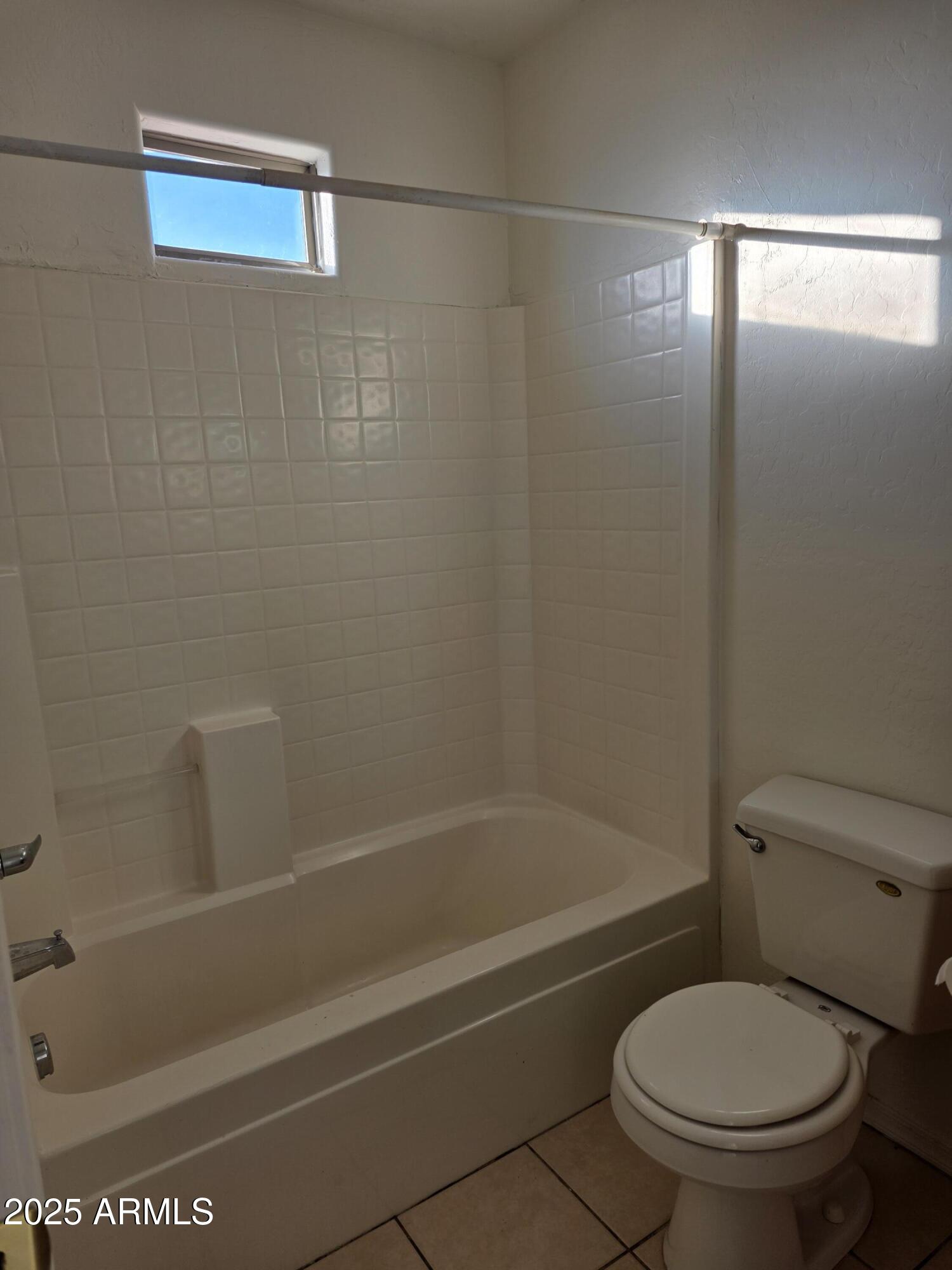 14091 South Berwick Road, Unit 4 Arizona City, AZ 85123 - Photo 10 of 10 a bathroom with a toilet and a bathtub