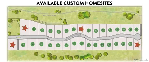 a front view of a building with large trees