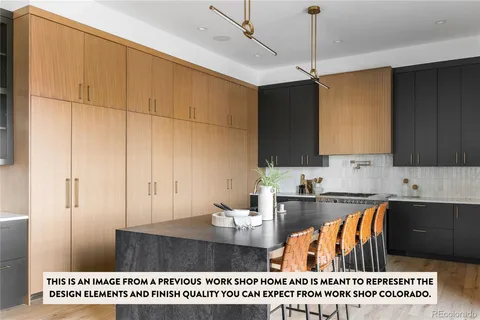 a bedroom with a large bed and a flat tv screen