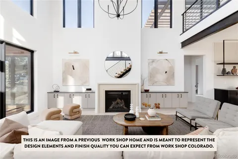 a spacious bathroom with a tub a mirror and a shower