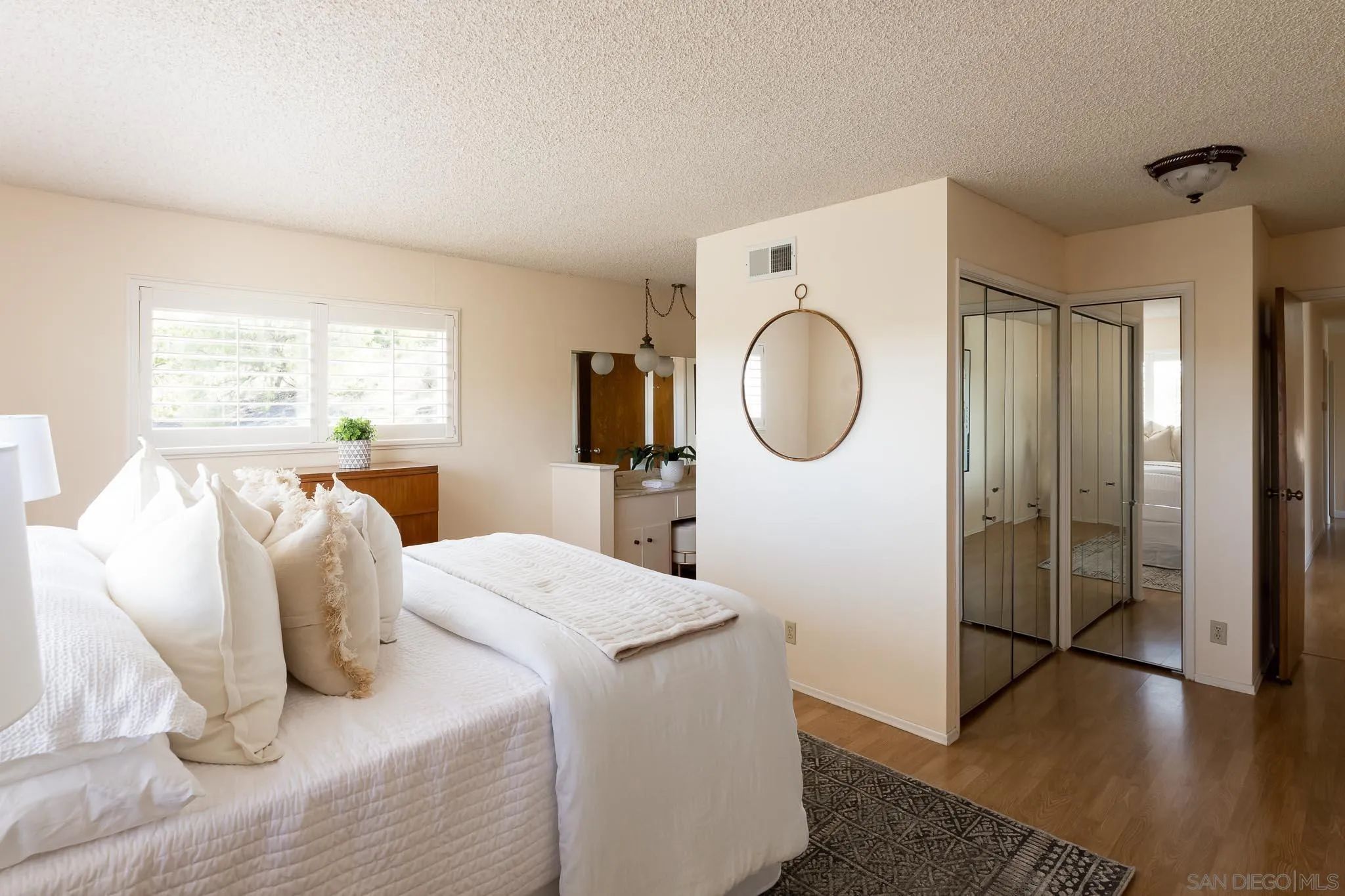 13995 Belvedere Drive Poway, CA 92064 - Photo 12 of 54 a bedroom with a bed and a mirror