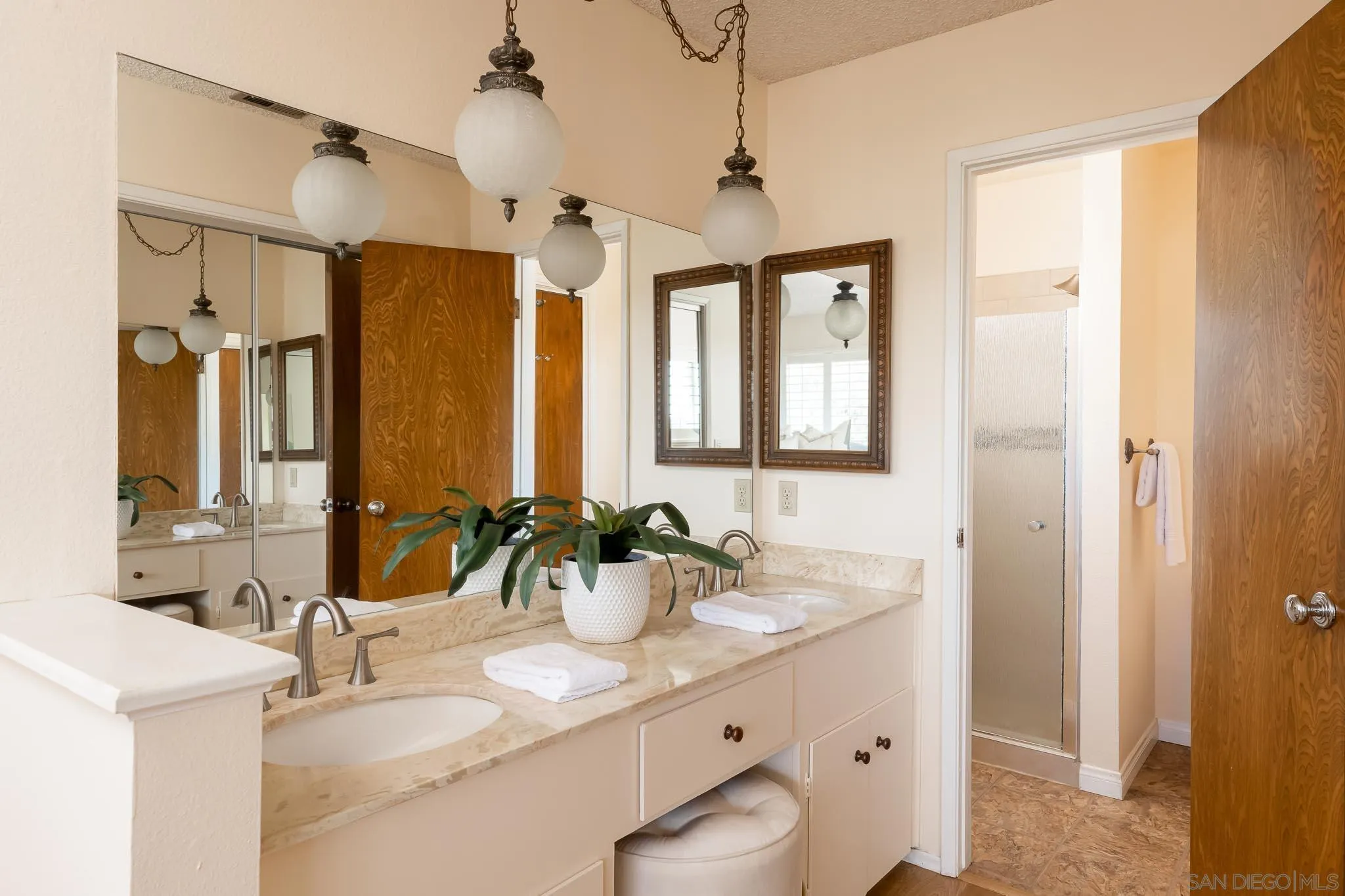 13995 Belvedere Drive Poway, CA 92064 - Photo 14 of 54 a bathroom with a double vanity sink mirror and double
