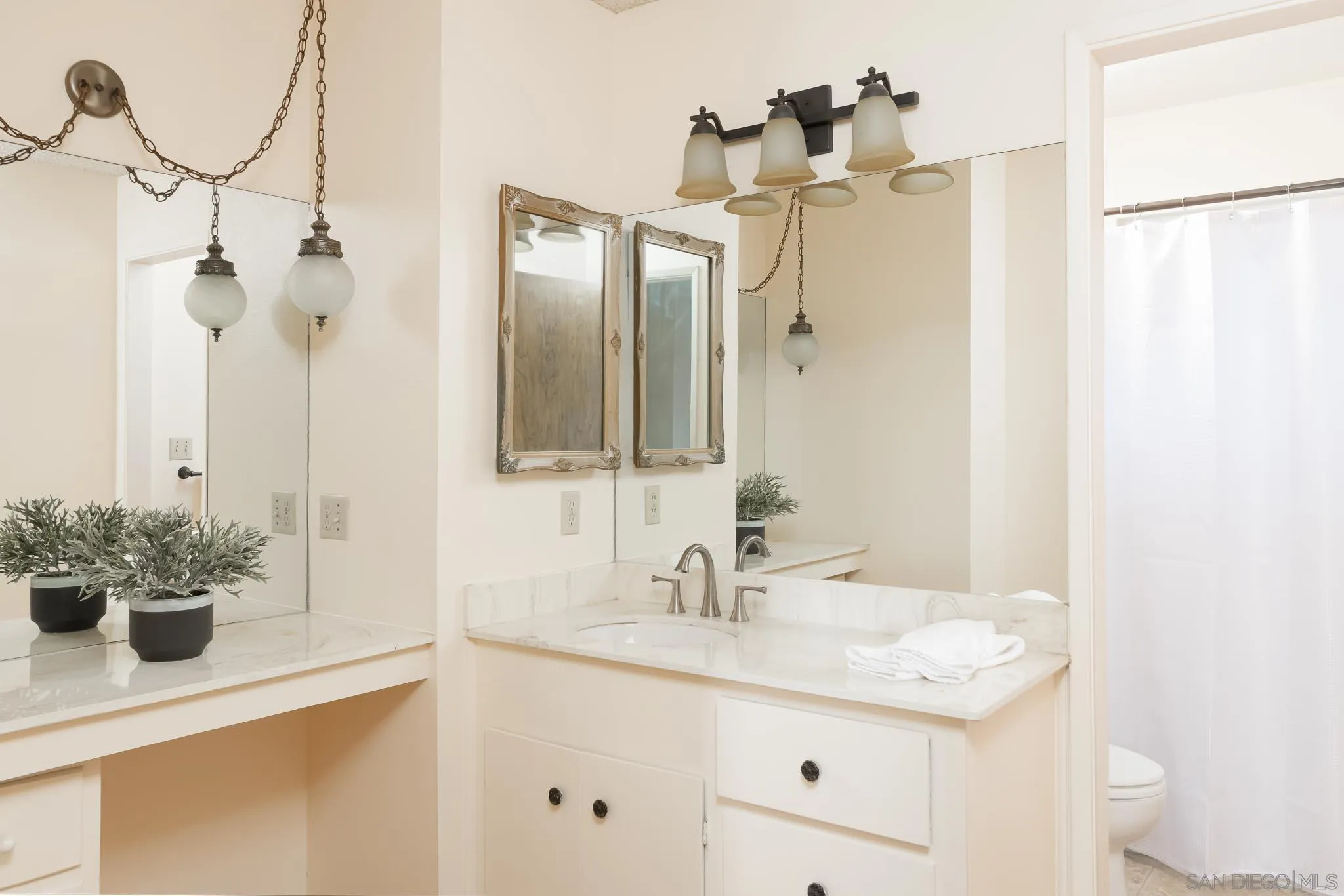 13995 Belvedere Drive Poway, CA 92064 - Photo 16 of 54 a bathroom with a sink vanity granite and a mirror