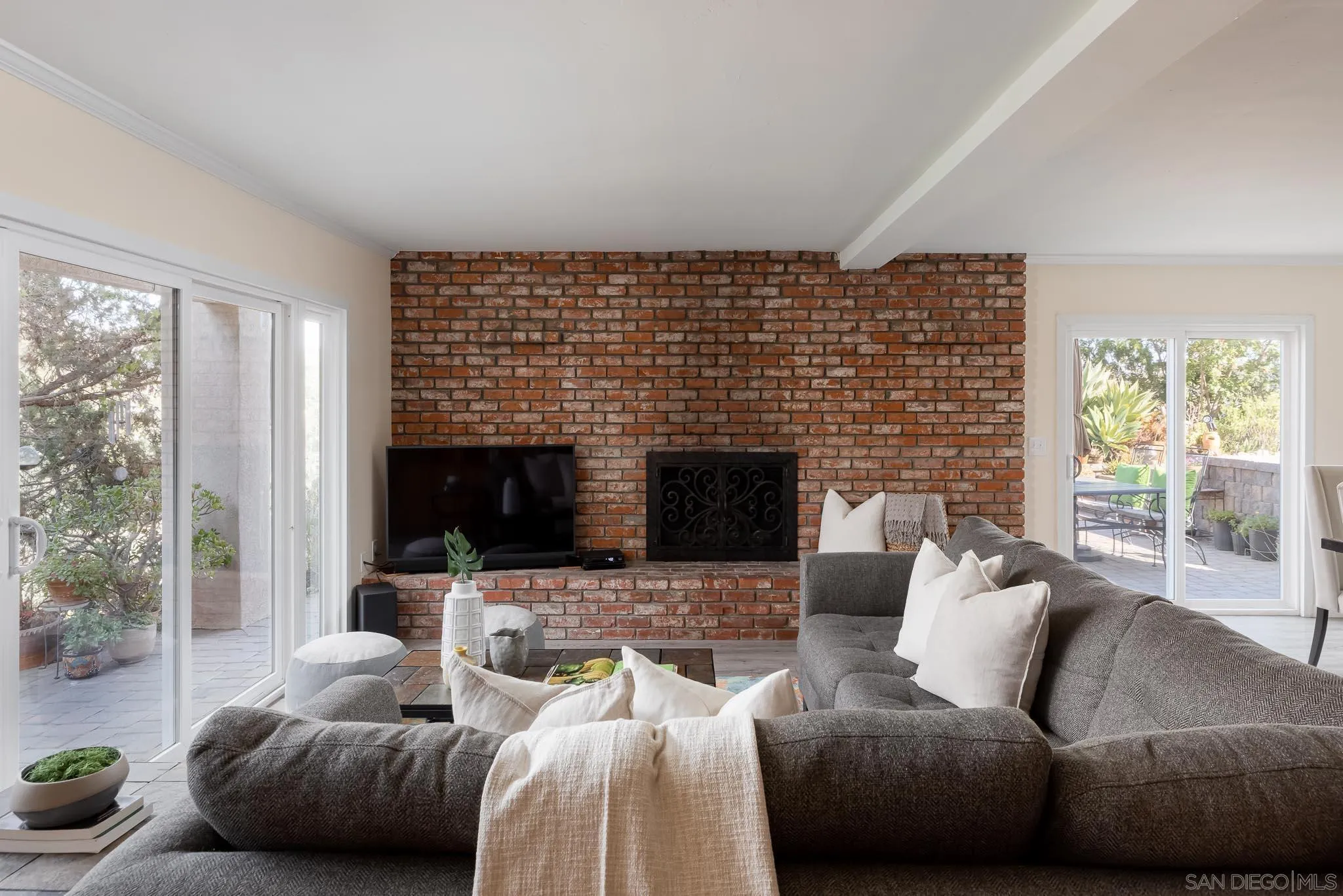 13995 Belvedere Drive Poway, CA 92064 - Photo 20 of 54 a living room with furniture and a fireplace