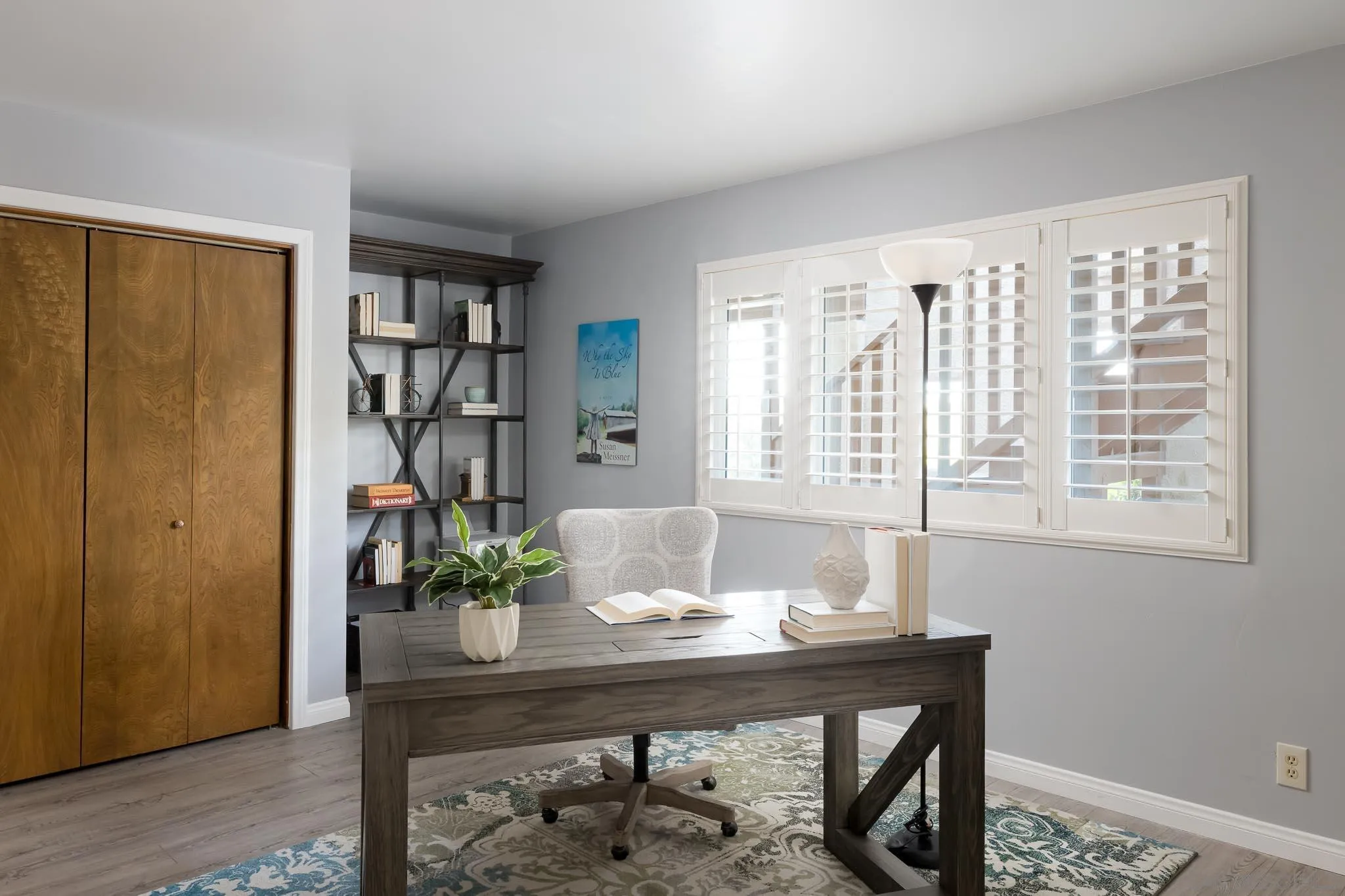 13995 Belvedere Drive Poway, CA 92064 - Photo 23 of 54 a view of a workspace with furniture and a potted plant