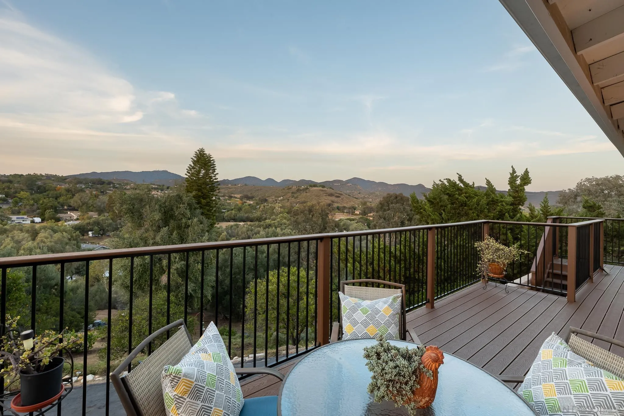13995 Belvedere Drive Poway, CA 92064 - Photo 27 of 54 a view of a balcony with two chairs and a table
