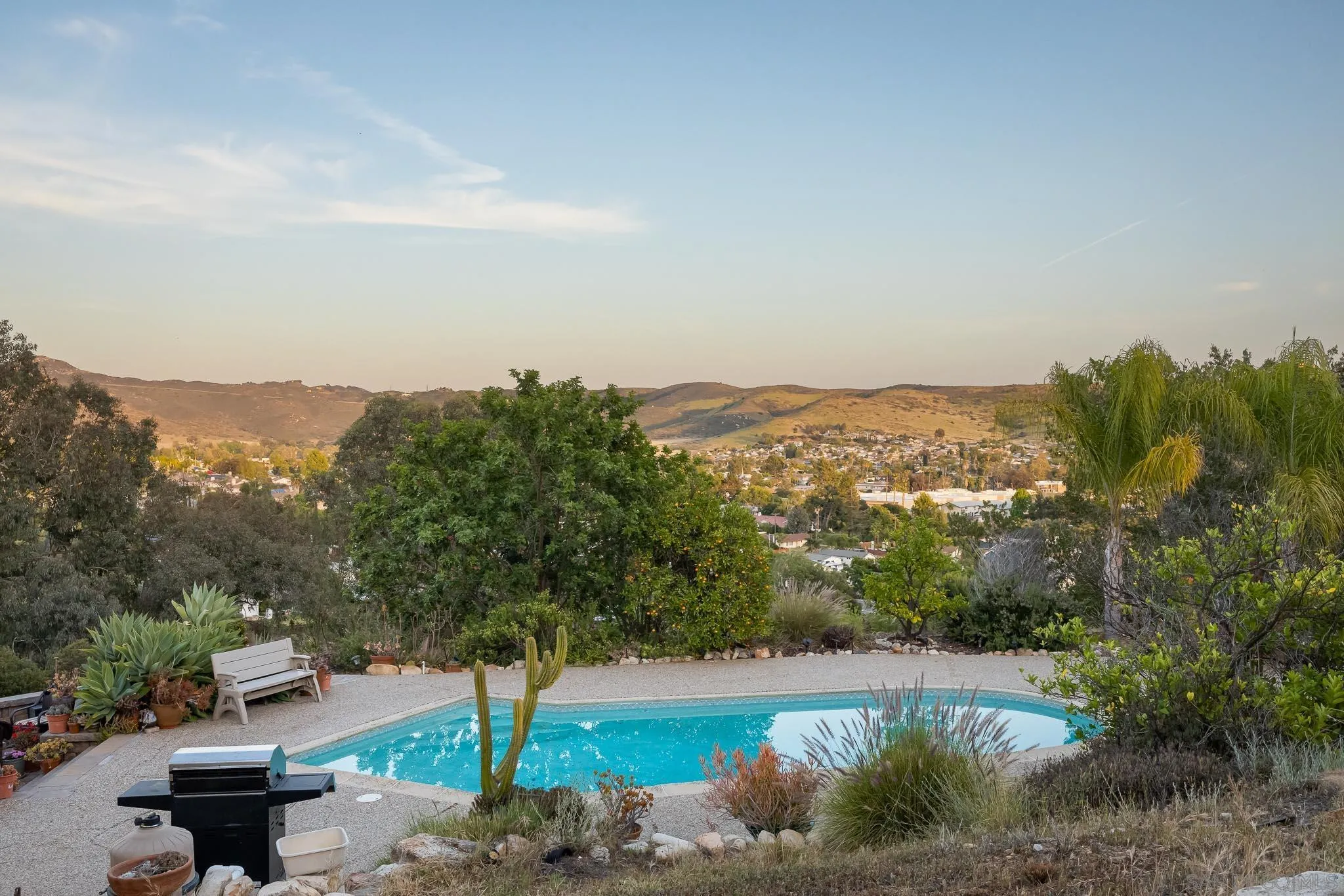 13995 Belvedere Drive Poway, CA 92064 - Photo 29 of 54 a view of a lake with a mountain in the background