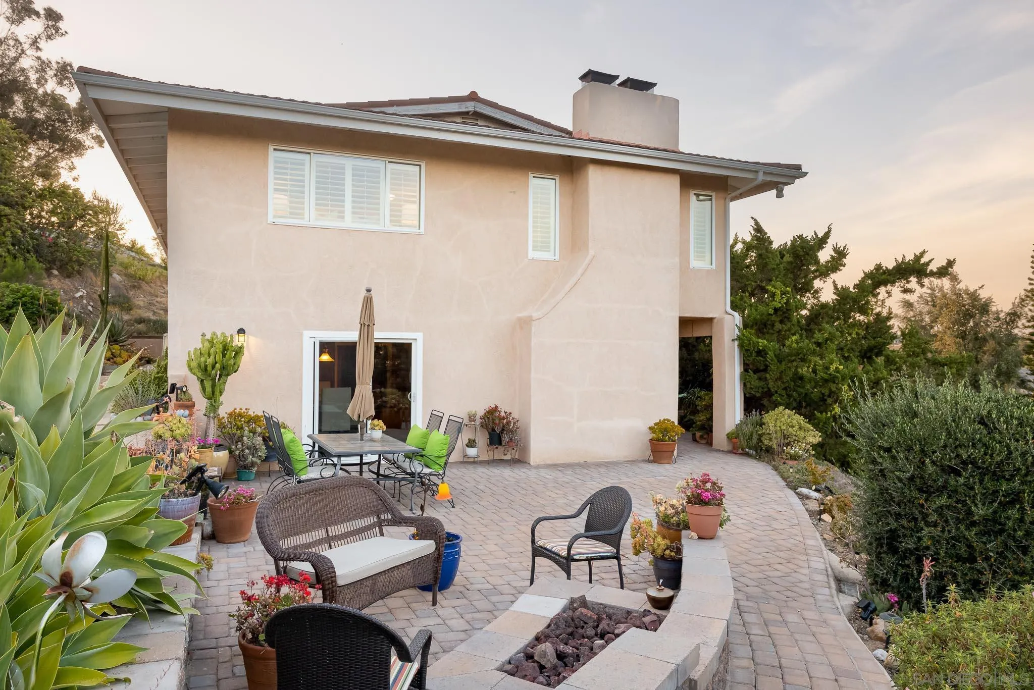 13995 Belvedere Drive Poway, CA 92064 - Photo 30 of 54 a backyard of a house with outdoor seating