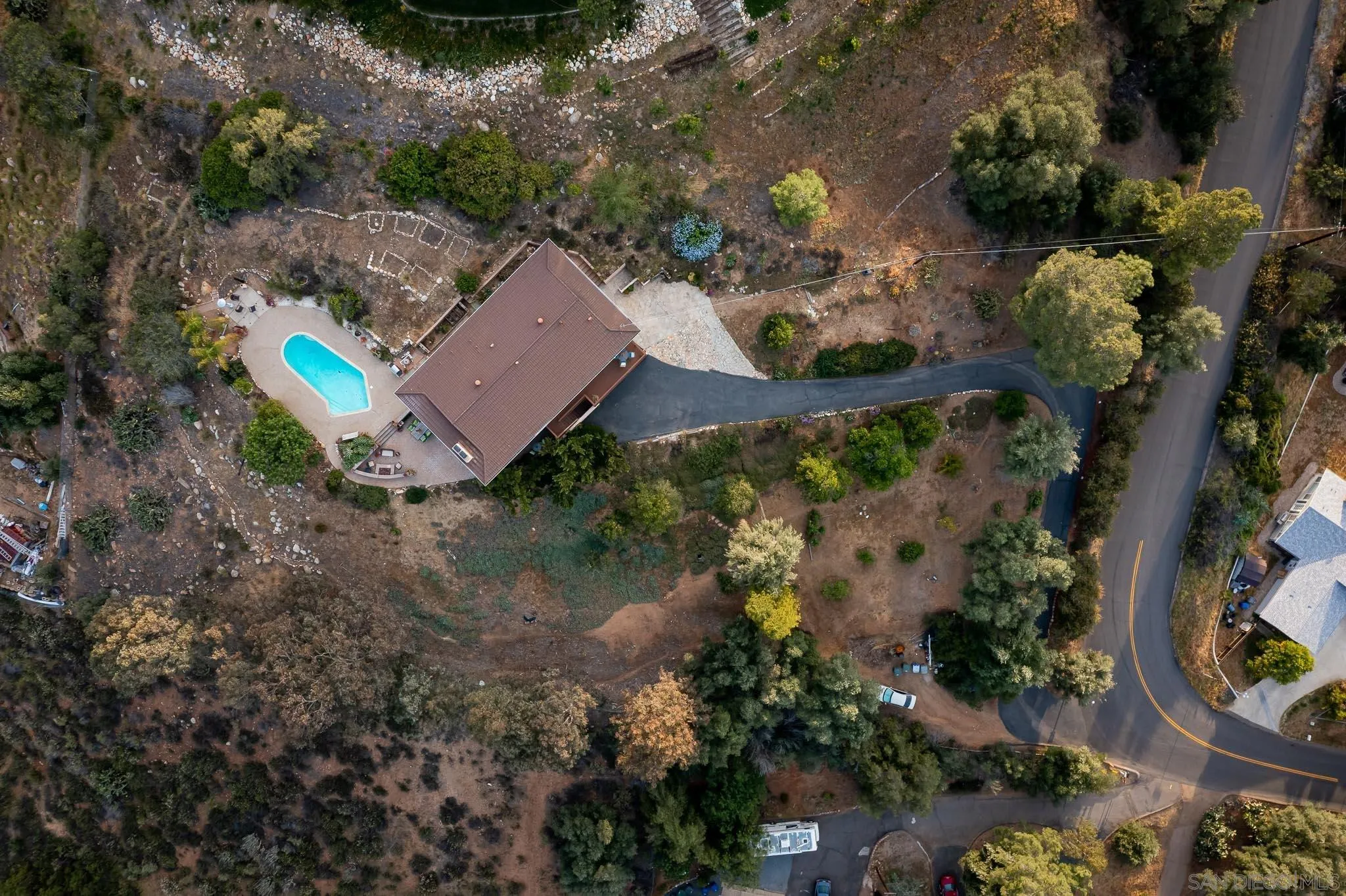 13995 Belvedere Drive Poway, CA 92064 - Photo 43 of 54 an aerial view of a house with a yard and garden