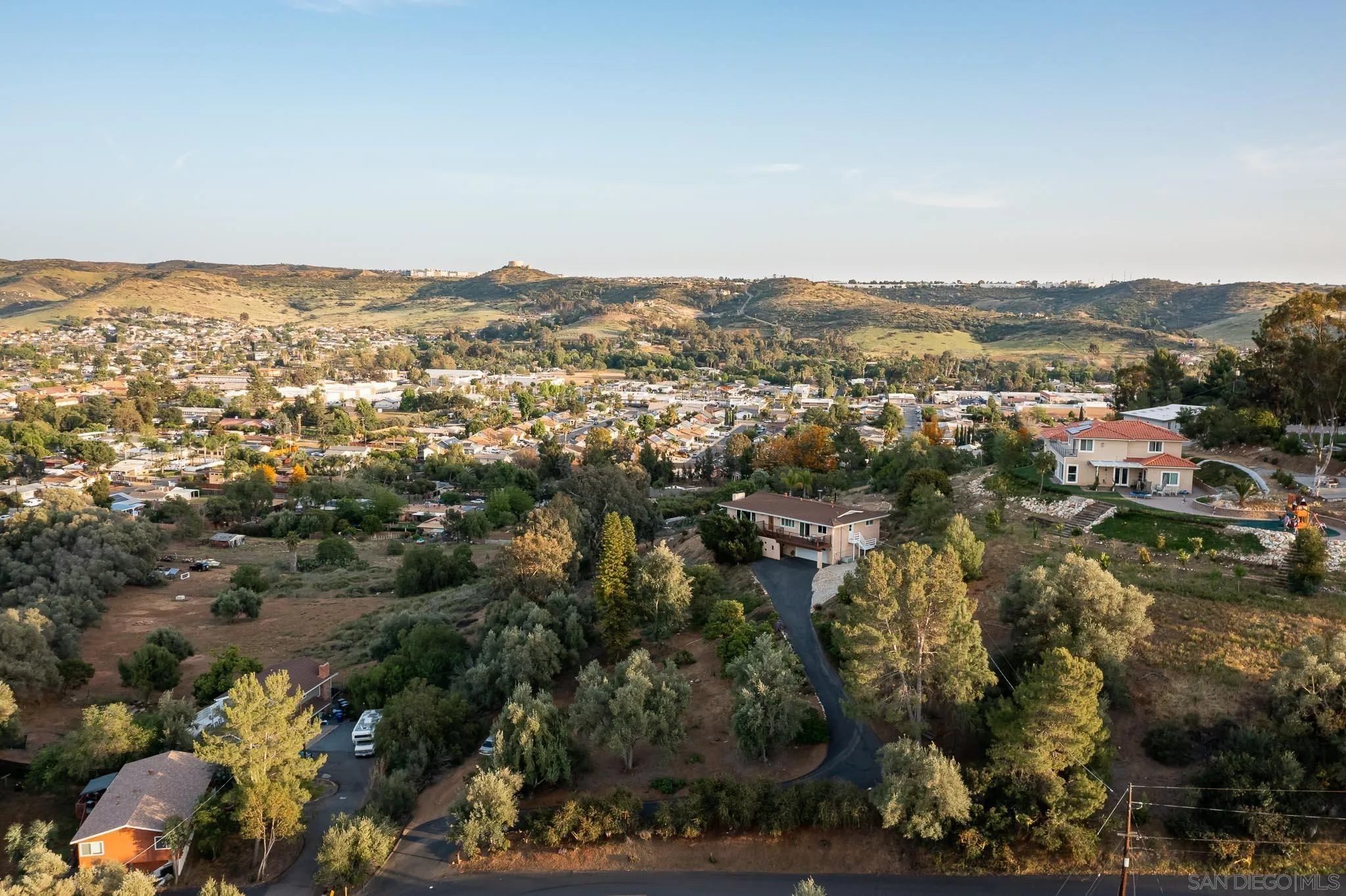 13995 Belvedere Drive Poway, CA 92064 - Photo 47 of 54 an aerial view of residential house with parking and trees