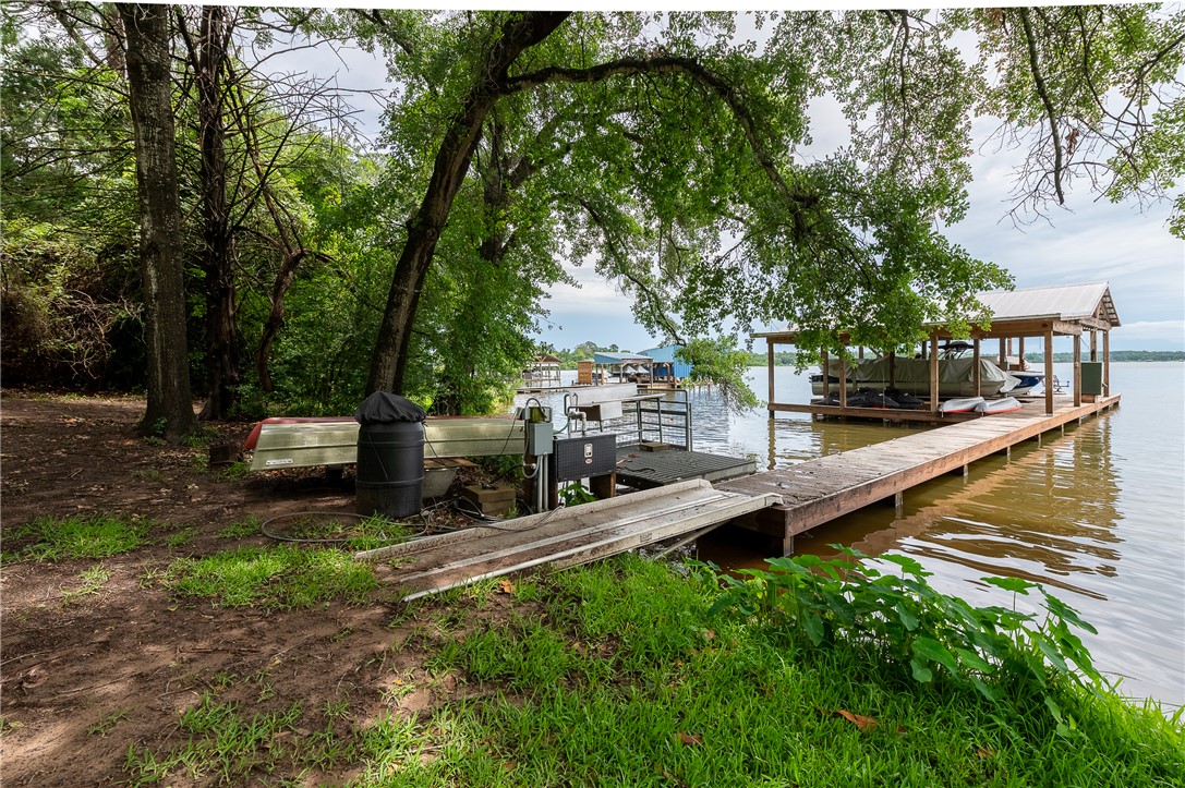 8695 Clyde Acord Road Franklin, TX 77856 - Photo 15 of 50 Boat dock w/3 bays
