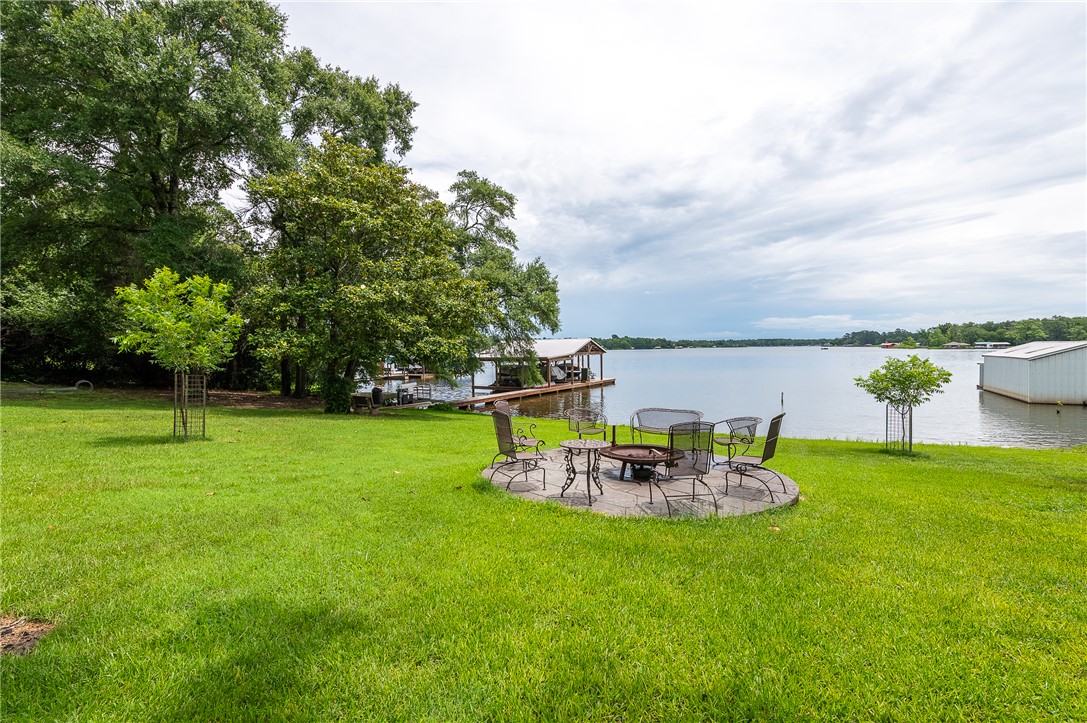8695 Clyde Acord Road Franklin, TX 77856 - Photo 16 of 50 View of lake from covered dining area