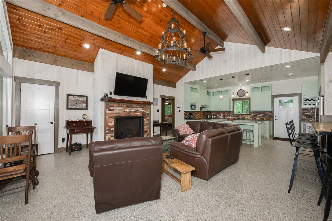 8695 Clyde Acord Road Franklin, TX 77856 - Photo 50 of 50 Open floorplan with central fireplace