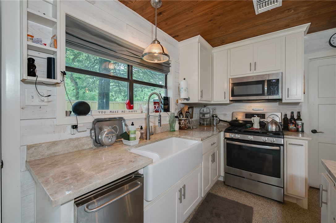 8695 Clyde Acord Road Franklin, TX 77856 - Photo 37 of 50 Casita kitchen with view of enclosed patio