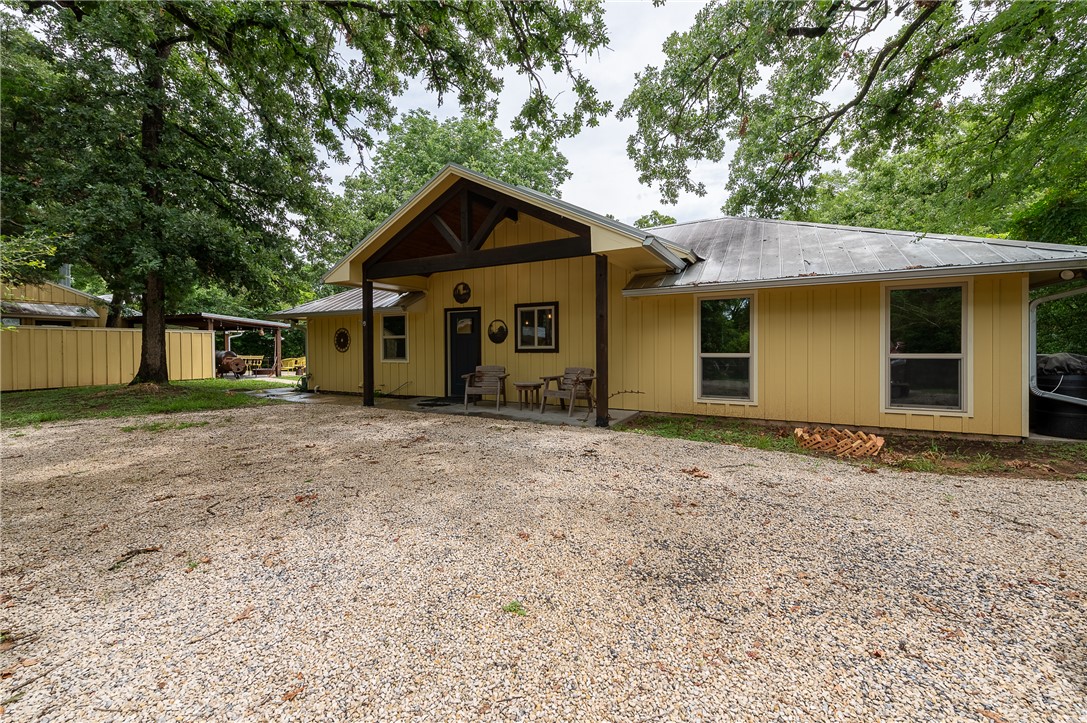 8695 Clyde Acord Road Franklin, TX 77856 - Photo 8 of 50 Covered gabled front porch